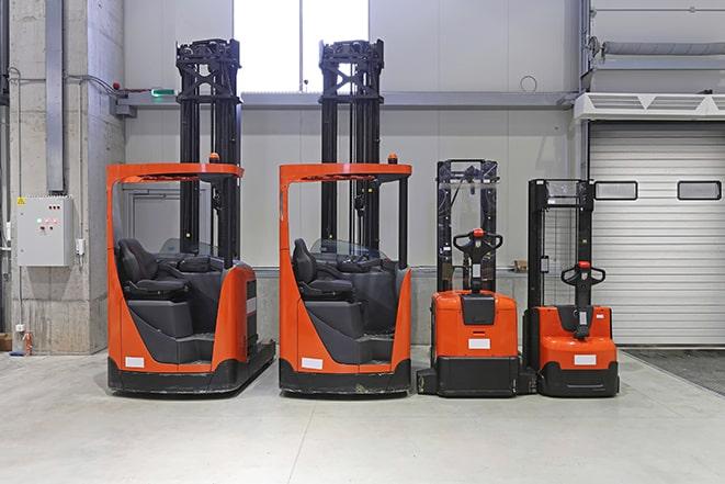 forklifts stored in a secure warehouse